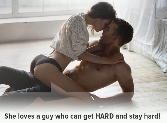 couple kissing on the bed